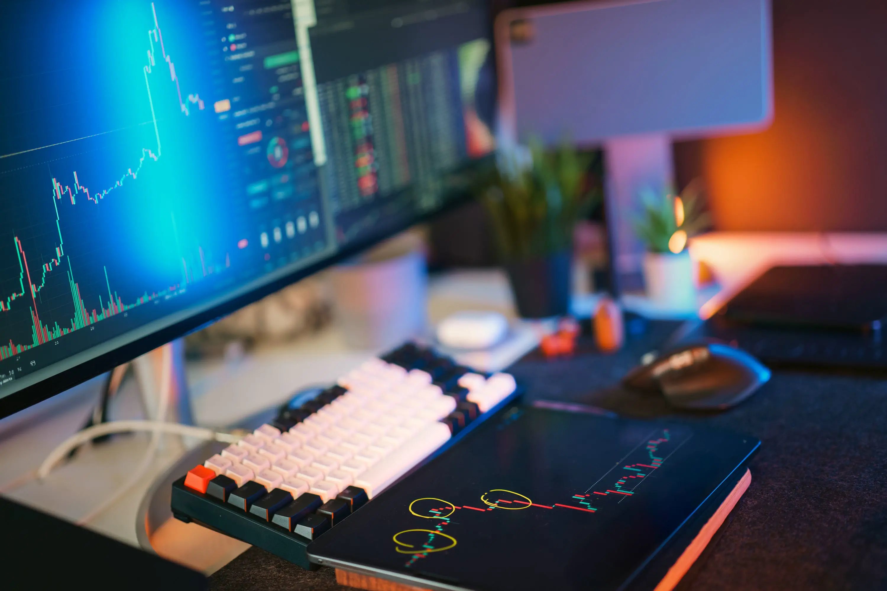 Research desk with financial charts and source materials